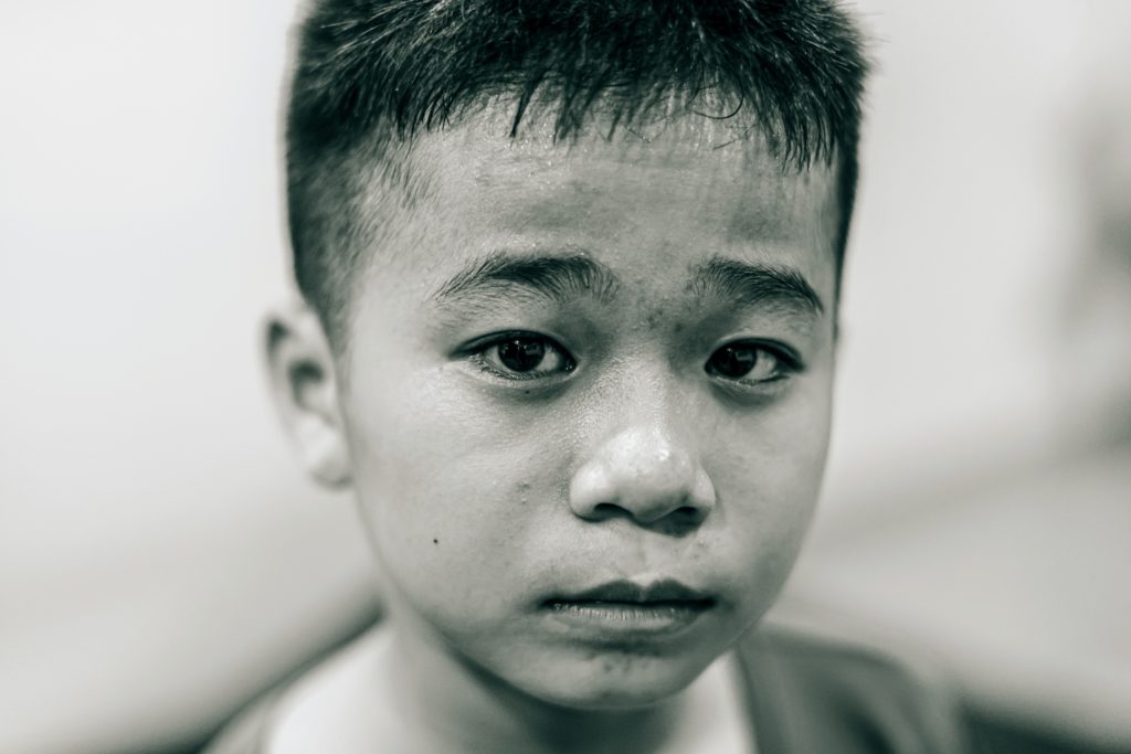 grayscale photo of boy